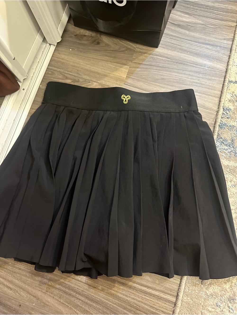 Aritzia Black Pleated Skirt with Yellow Logo